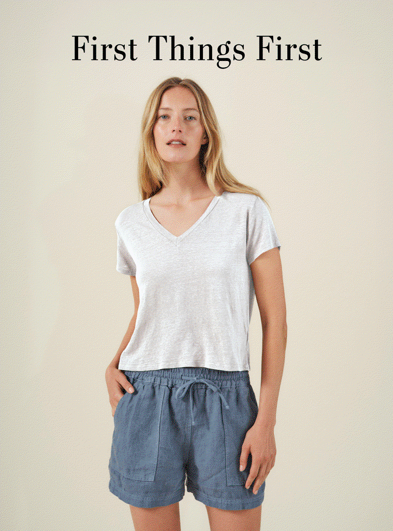 Image shows a model wearing the Virginia Skirt in Navy. Image shows a model wearing the Sutton Shorts in Hailstone. Image shows a model wearing the Louise Top in Off White. Text Reads: First Things First