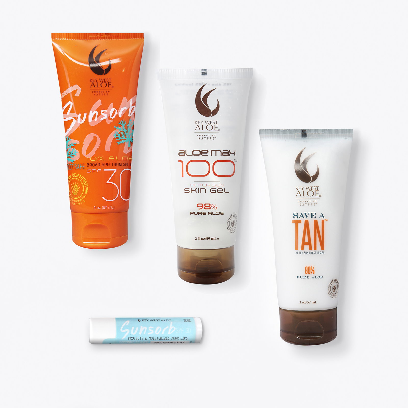 sun-kissed to go set of sunsorb sunscreen, aloe max 100, save a tan, sunsorb lip balm on a white background