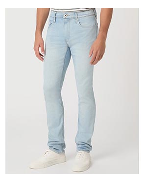 Image of a man's legs in a pair of blue denim jeans.