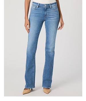Image of a woman's legs in a pair of blue denim jeans.