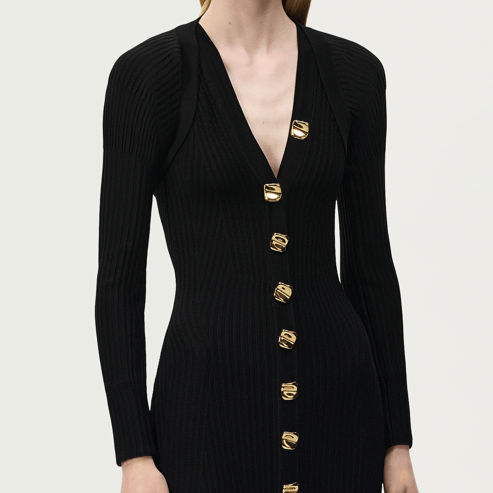Gif of a model wearing the safi shrug with the matching eliza dress