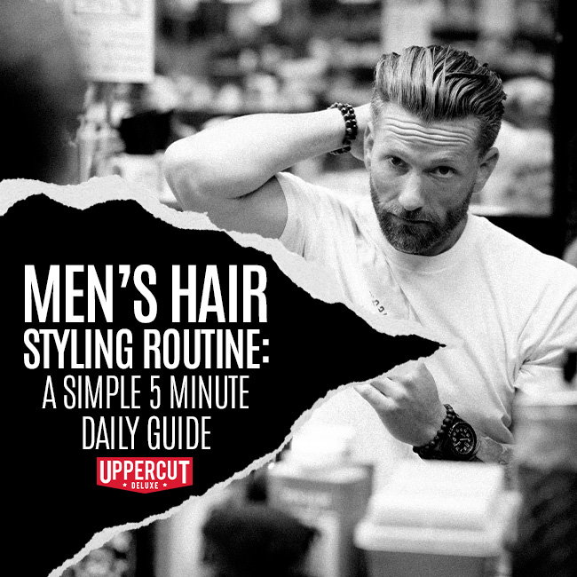 Man styling his hair while looking into a mirror