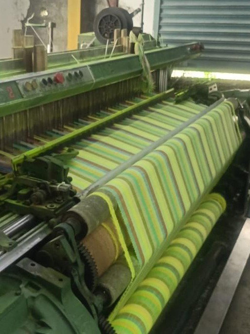 colorful yarns on loom