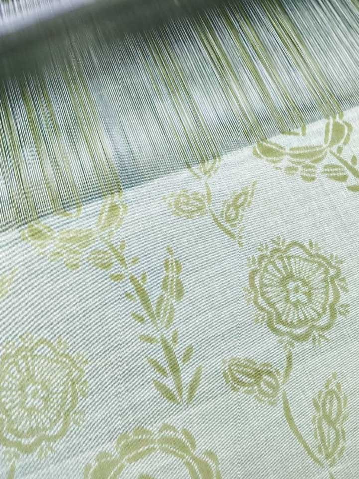 floral textile on the loom