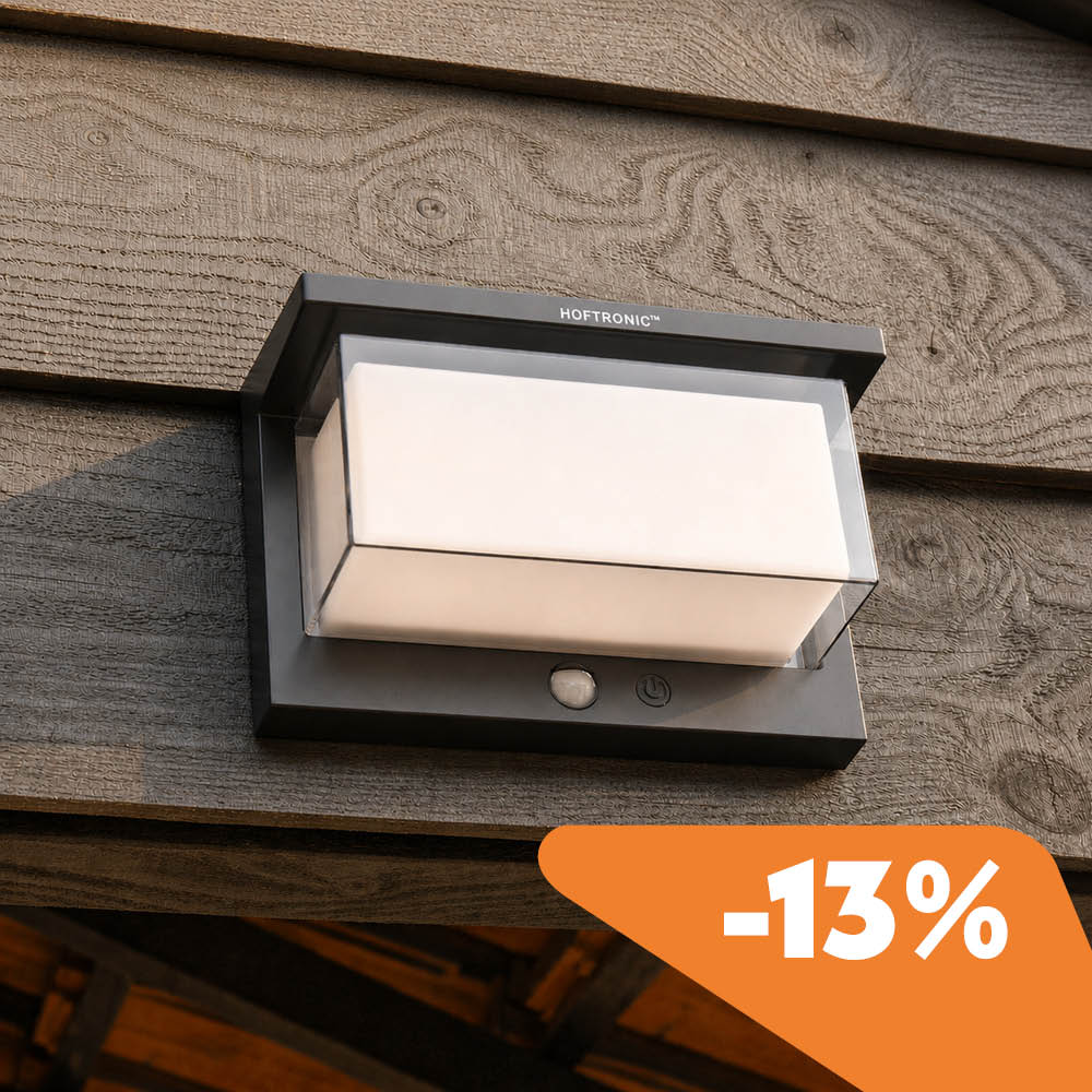 Arlo solar light on a wooden fence with discount.