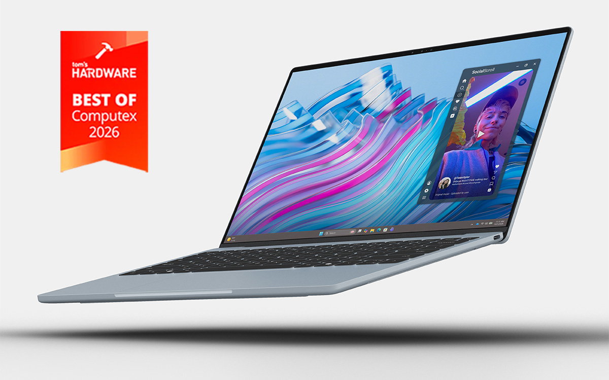 Dell XPS laptop with an ultra-thin design floating against a gray background, displaying colorful visuals on screen and featuring a Tom's Hardware Best of Computex 2026 award badge.