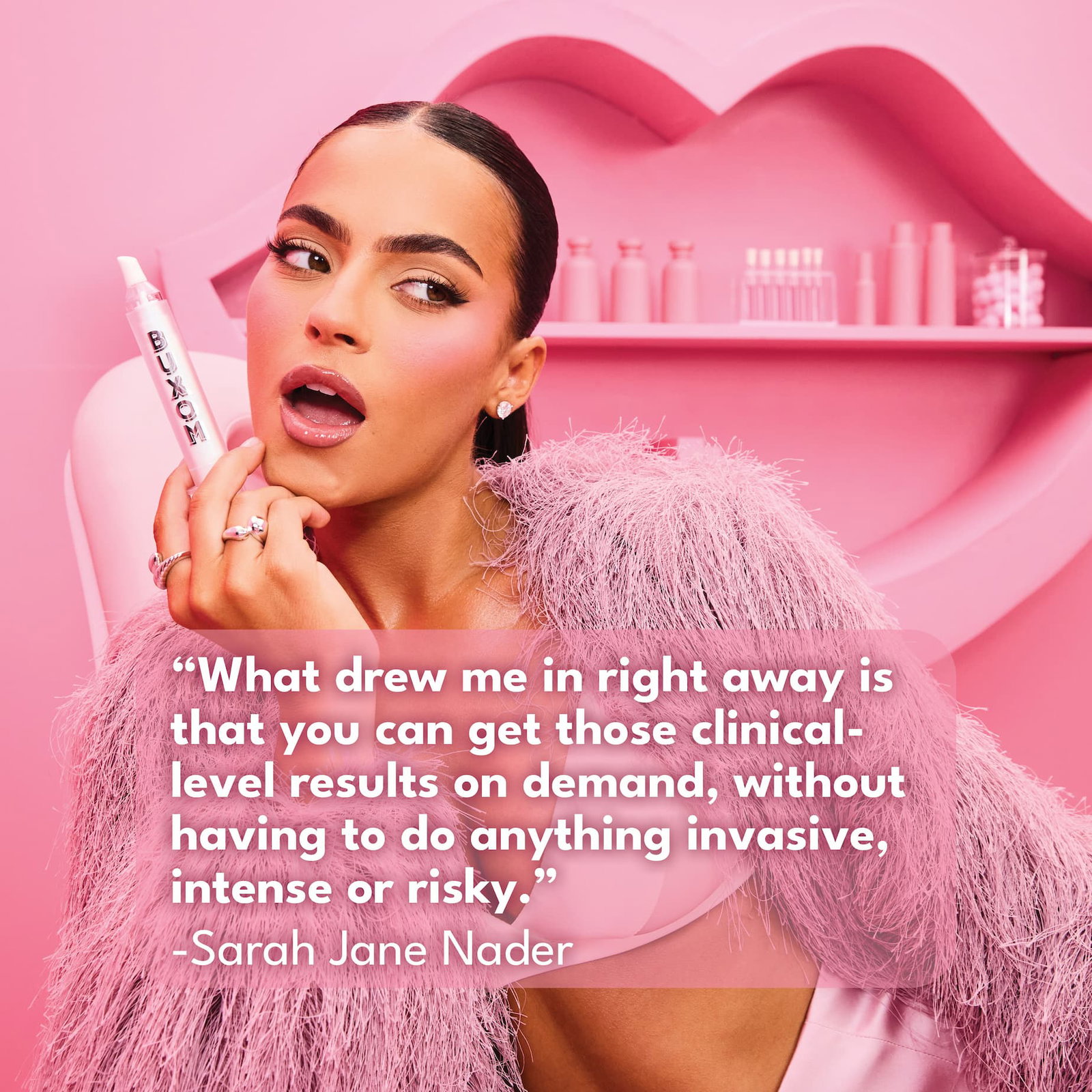 Sarah Jane Nader holding Plump Shot Fill & Blur Primer