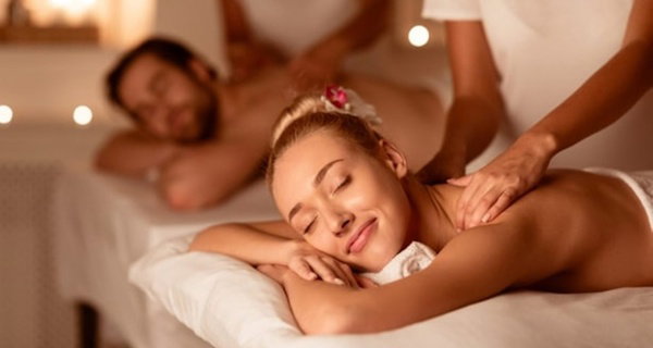60 or 90 Min Couples Swedish or Hot Stone Massage Up to 50% Off