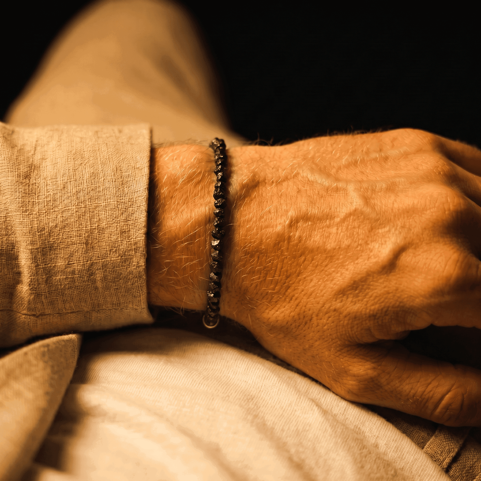 Raw Black Diamond Bracelet, 25 carats, worn on the wrist