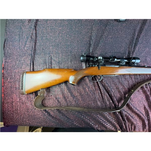 308 Parker-Hale Ltd. Birmingham bolt-action rifle, serial D4775. Features a wood stock with checkeri