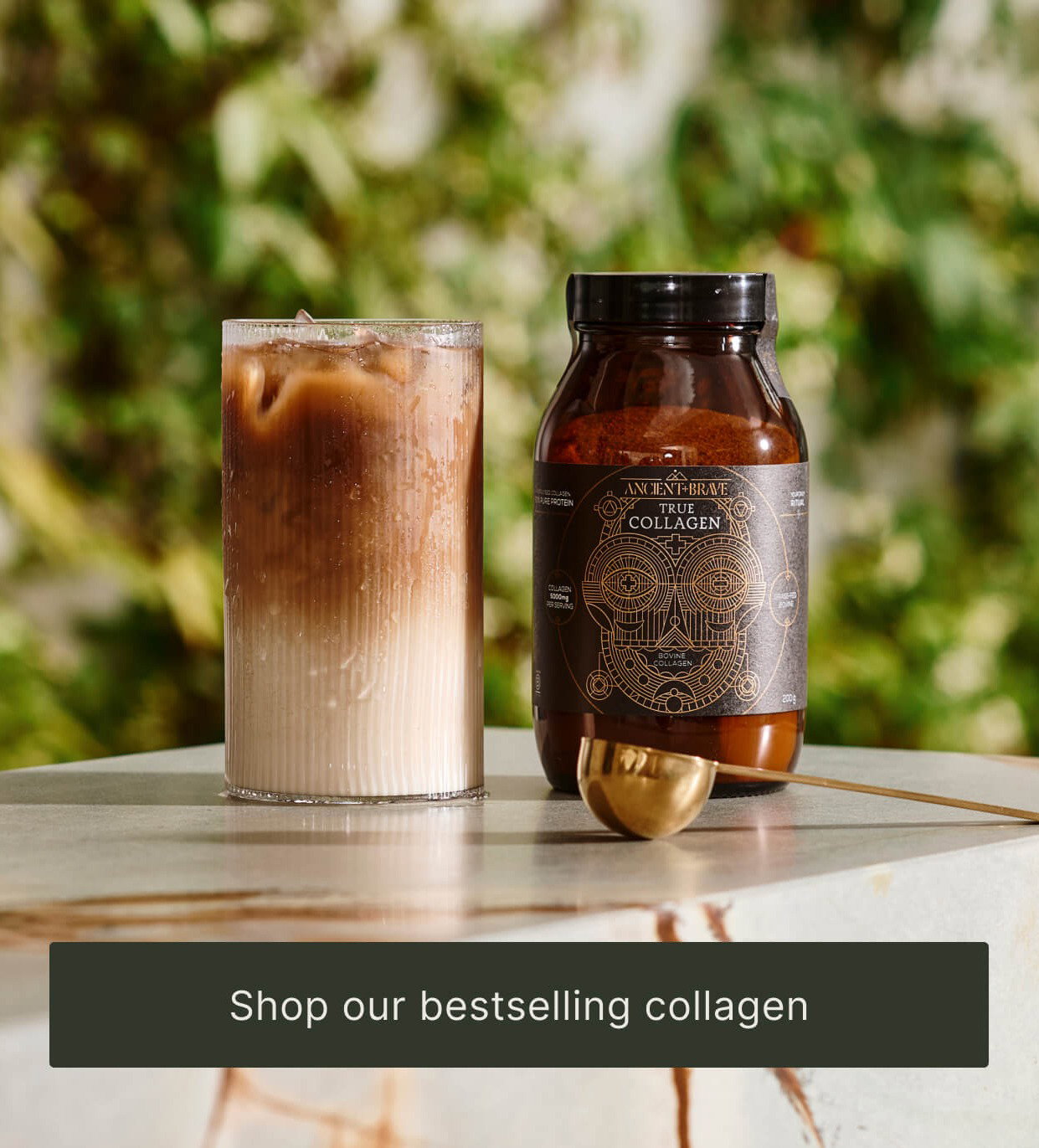 True Collagen and a glass of iced coffee latte. The button is overlaid with the text 'Shop our bestselling collagen'.