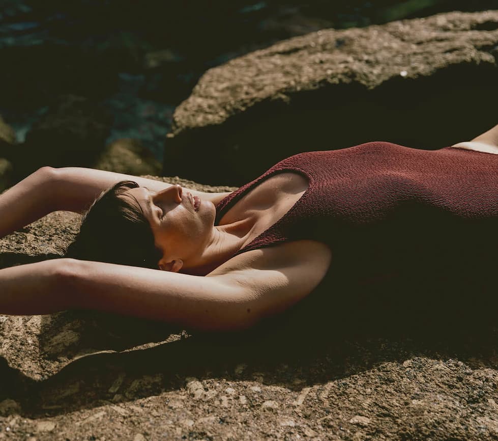 Woman stretched out on a beach
