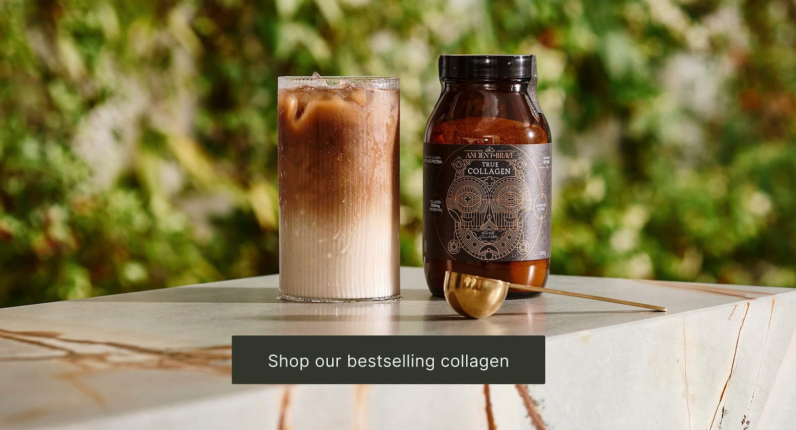 True Collagen and a glass of iced coffee latte. The button is overlaid with the text 'Shop our bestselling collagen'.