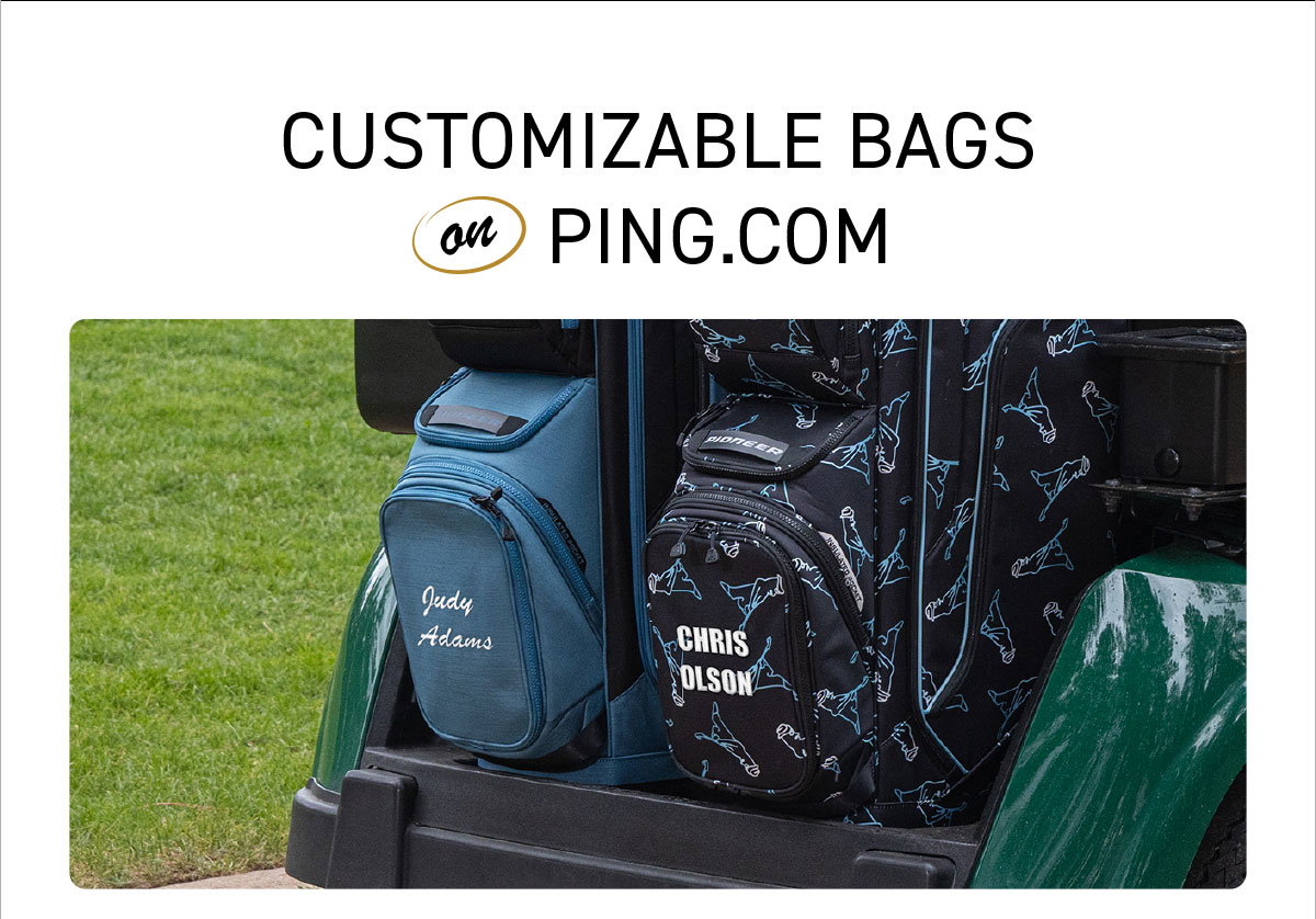 Lifestyle image of two custom embroidered bags sitting in the back of a golf cart.