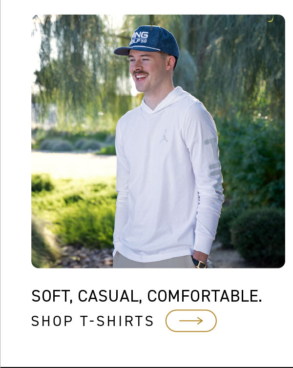 Lifestyle shot of PING Lightweight Hoodie in White worn on course. Click to shop apparel.