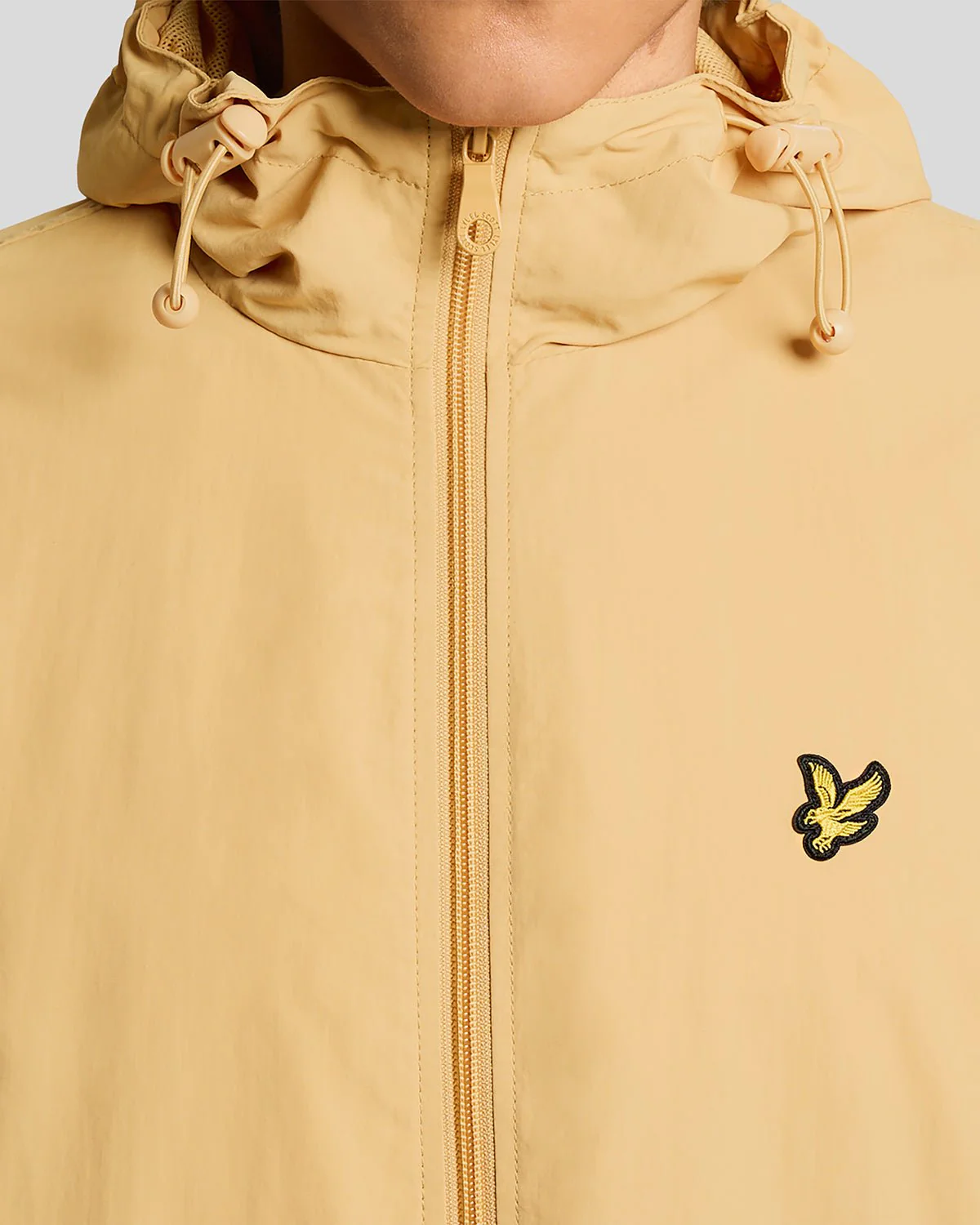 Man wears Water Resistant Hooded Jacket in Honeycomb 