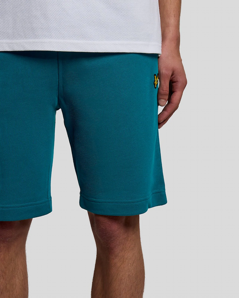 Man wears Cotton Sweat Shorts in Lagoon
