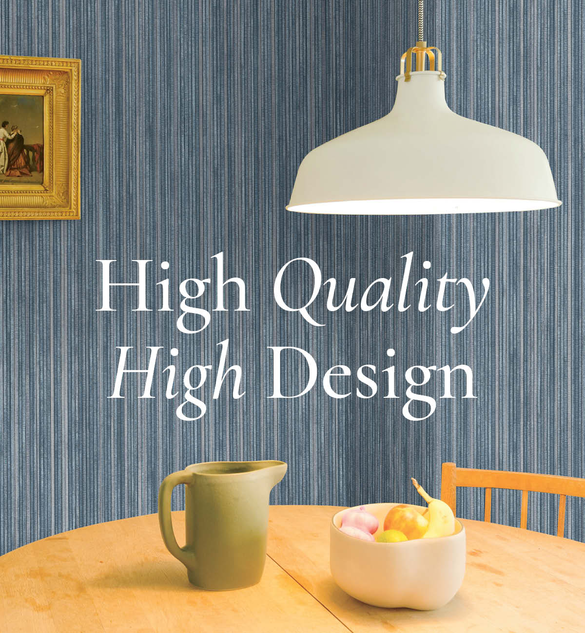 Image of Tempaper's Faux Grasscloth wallpaper in chambray blue on a wall behind a table with a pitcher and bowl of fruit. Text overlay "High Quality High Design"