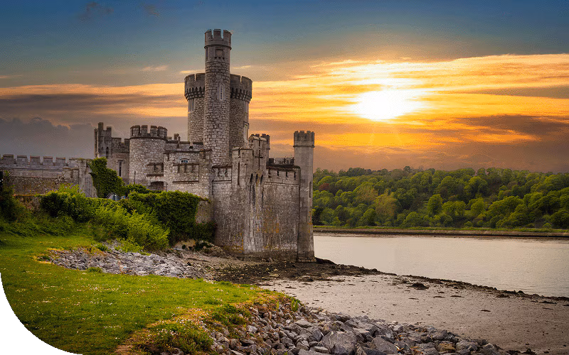 A castle during sunset in Cork, Ireland.