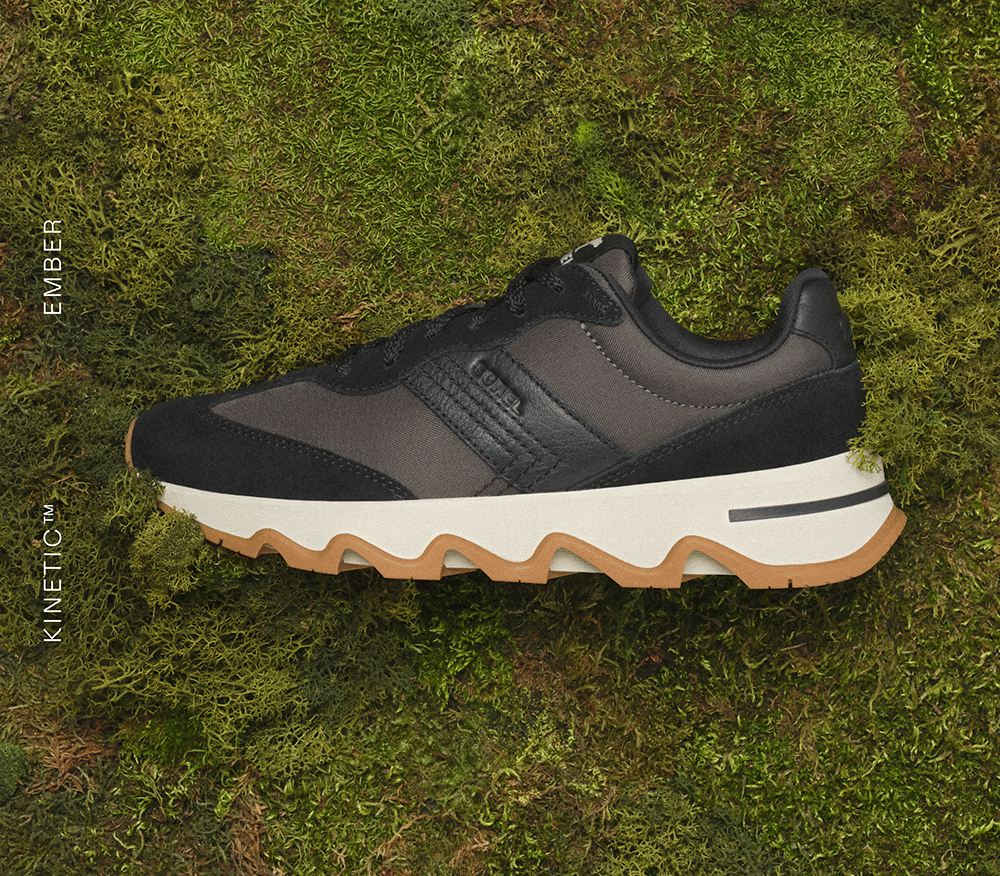 Kinetic™ Ember Sneaker in Black on grass