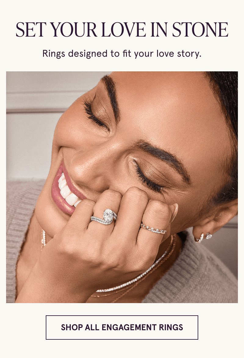 A model wearing unique engagement rings. Designed to fit your love story. Click here to shop all engagement rings