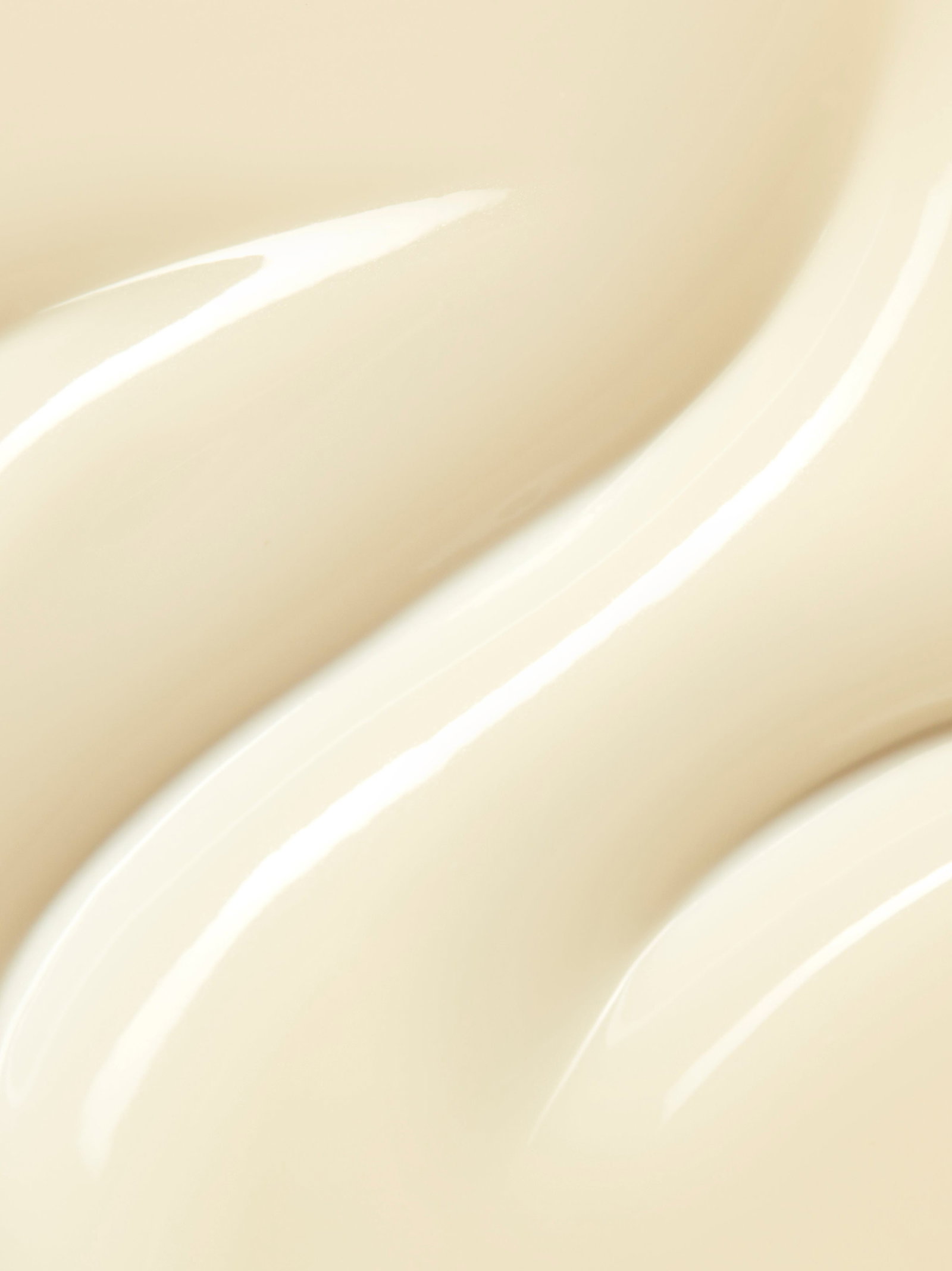 Swatch of texture of a white creamy serum