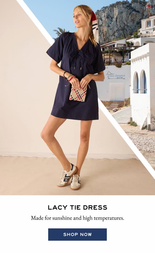 Lacy Tie Dress - Made for sunshine and high temperatures. - Shop now - Image of a woman wearing a navy short sleeve dress that falls above the knee.