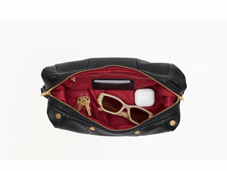 Top-down view of the Hammitt Erica Med in Black Pebble leather showing the spacious interior with everyday essentials.