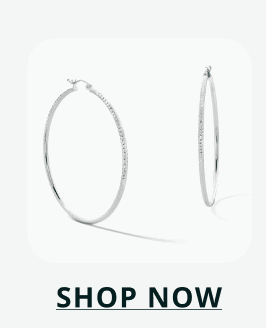 Dainty, large silver hoops. Click here to shop now