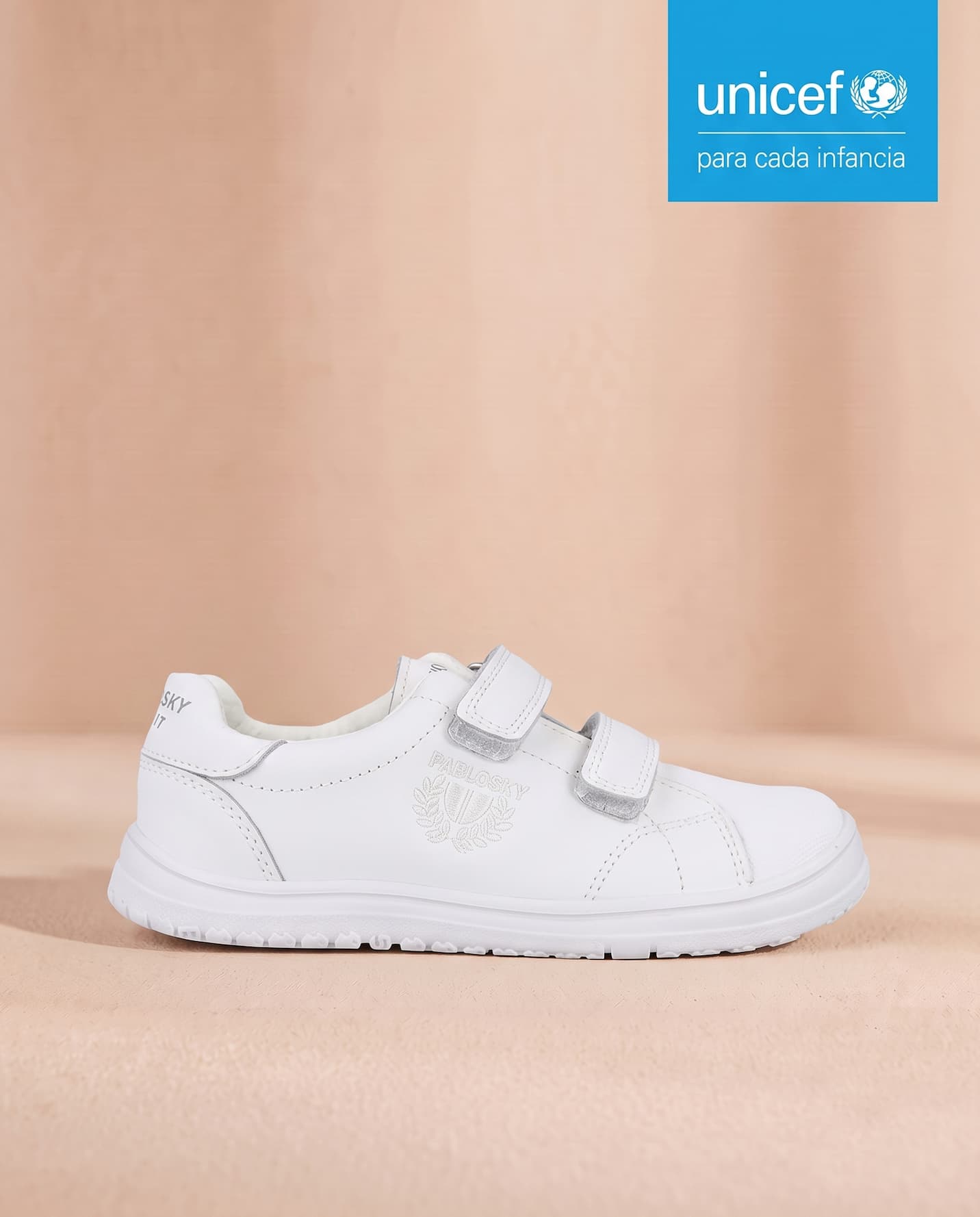 Zapato infantil blanco con bloque UNICEF