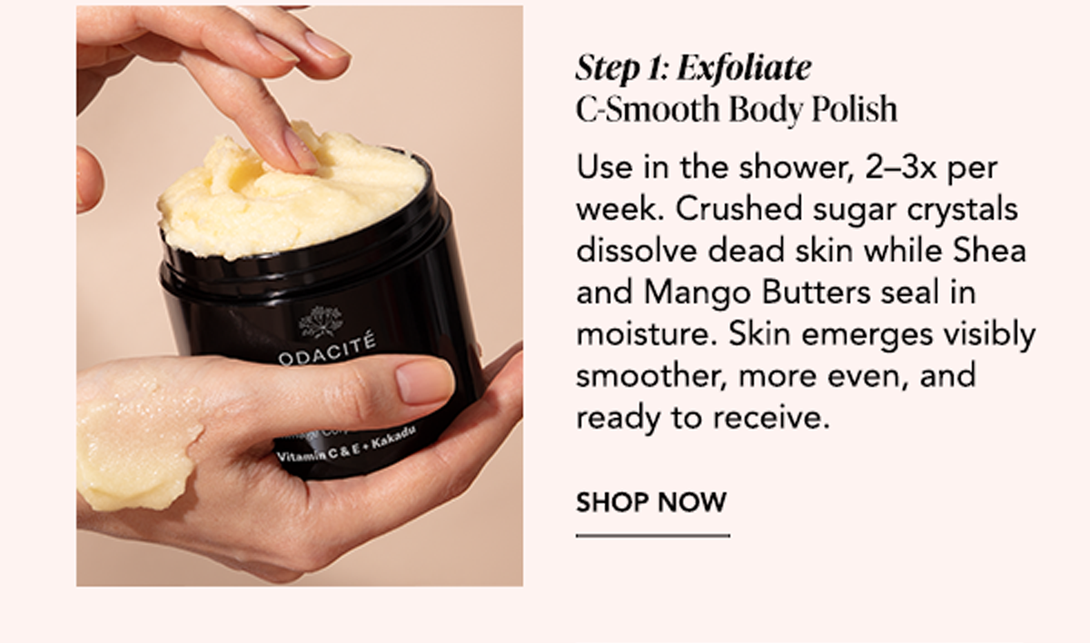 Hands holding an open jar of C-Smooth Body Polish, a sugar-based exfoliating treatment used in the shower to smooth and soften skin.