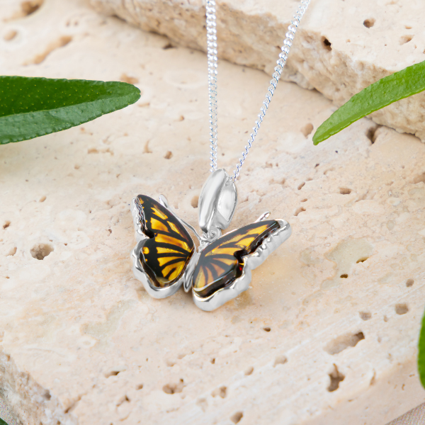 https://www.henryka.co.uk/products/miniature-butterfly-necklace-in-silver-and-amber-copy?_pos=1&_sid=d02df6302&_ss=r