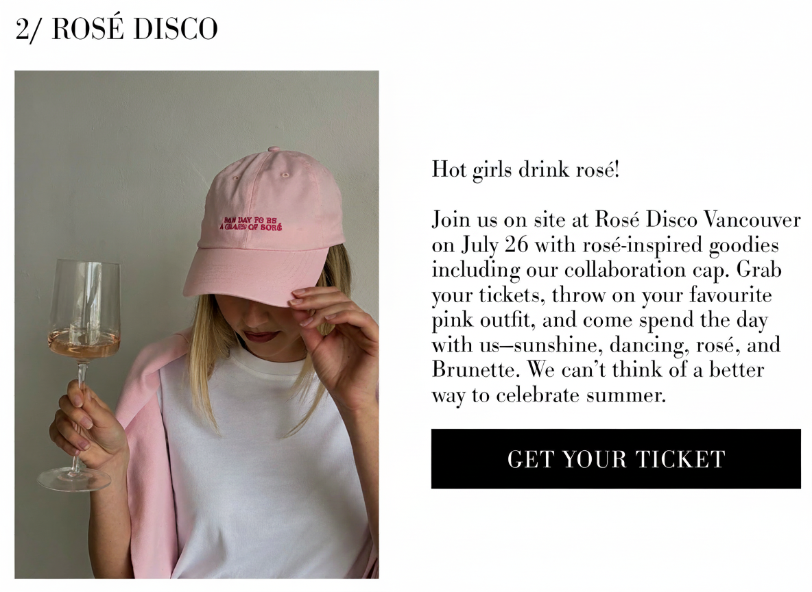 A woman in a pink cap and white shirt holds a glass of rosé.