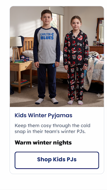 Two kids in a bedroom wearing Kid's AFL Pyjamas