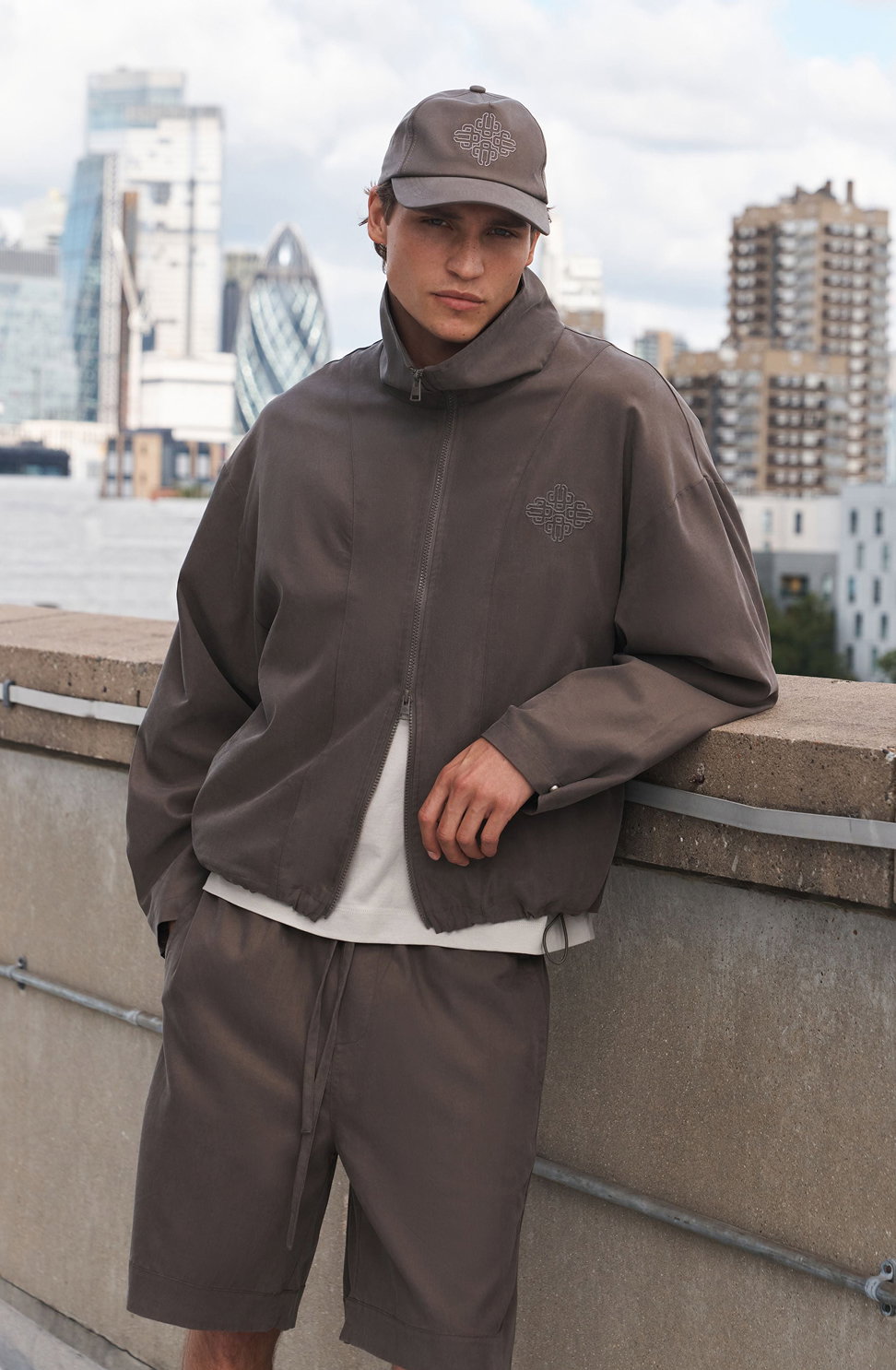 CUPRO FUNNEL NECK ZIP THROUGH