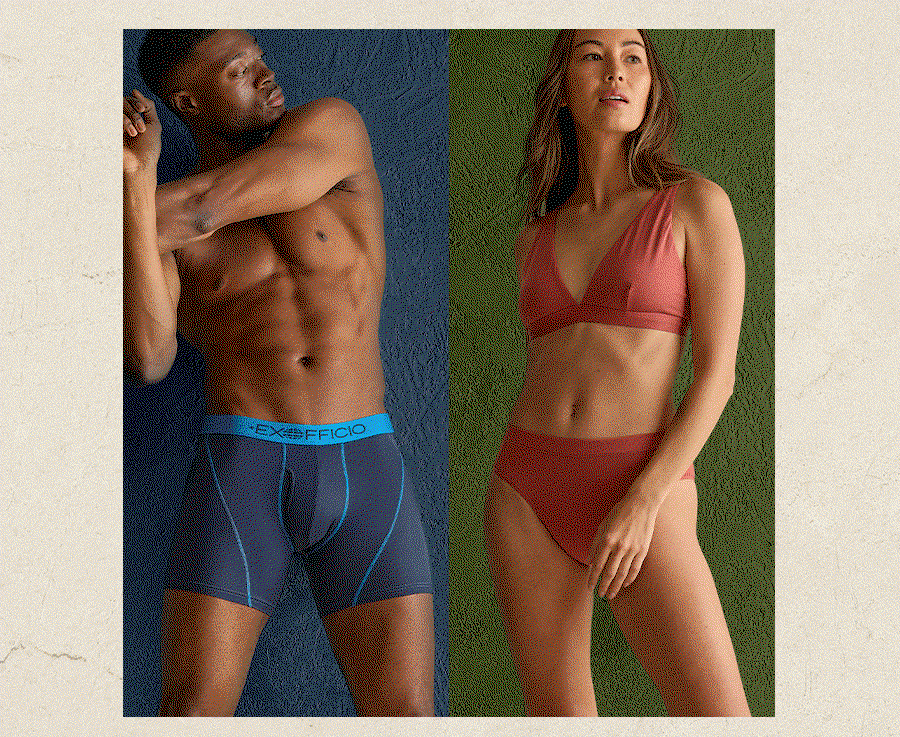 Man in navy ExOfficio boxer briefs stretching against a blue textured wall, next to a woman in a rust-colored bra and underwear set against a green textured wall.