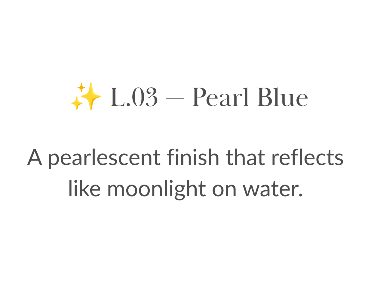 Bottle of pearlescent blue nail polish standing in rippling water with shimmering reflections.