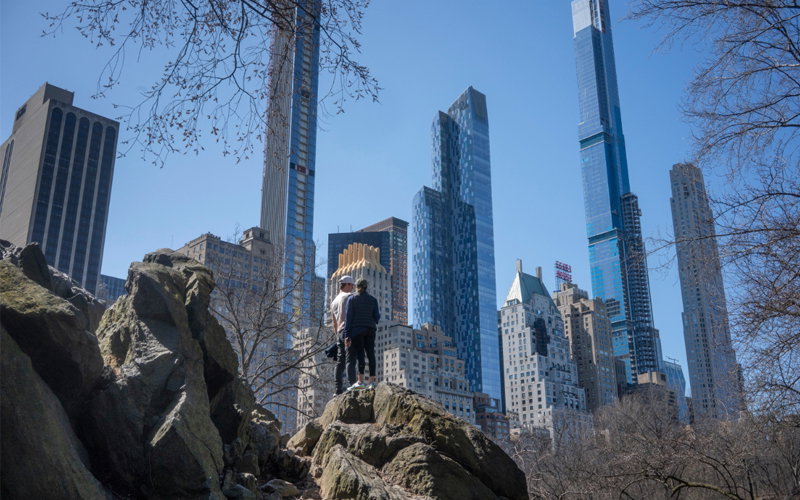 People take in the view NYC skyline from Central Park 