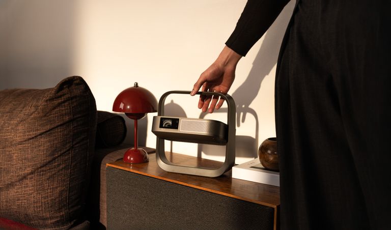 Portable projector on a table