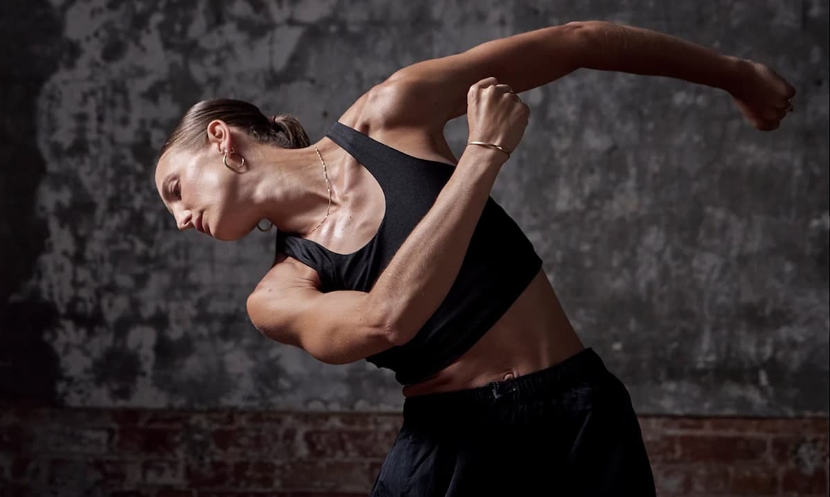 A woman stretching in yoga pose
