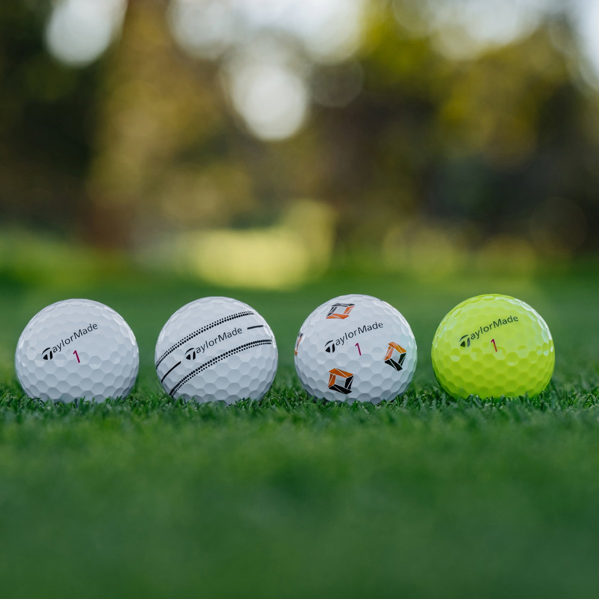 Selection of Golf Balls on grass