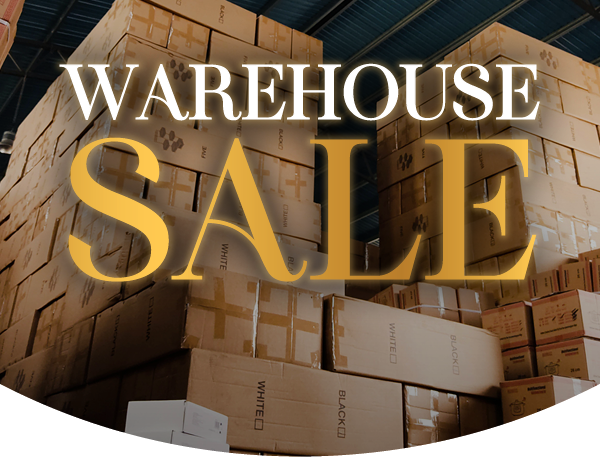 Image of a stack of boxes in a warehouse with "WAREHOUSE SALE" in large lettering 
