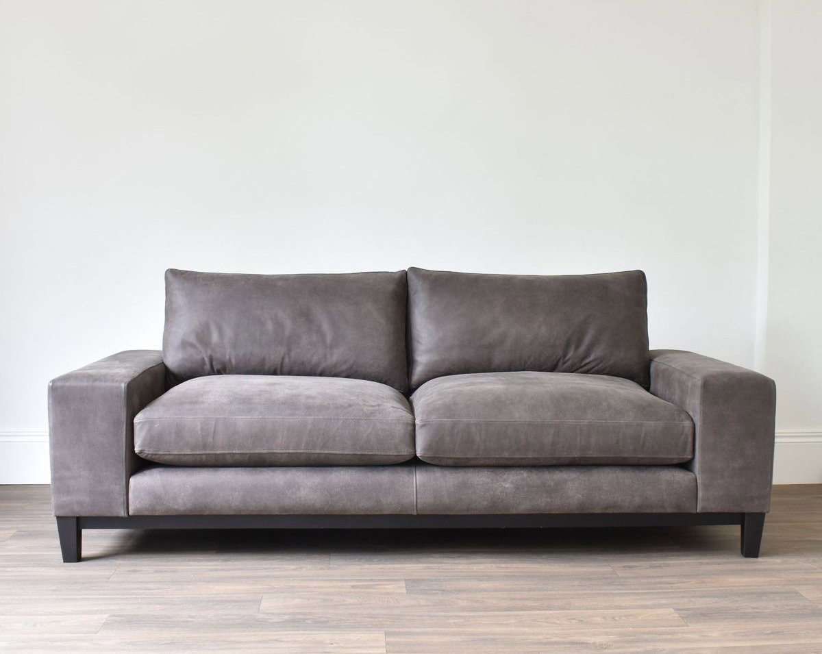 grey leather contemporary sofa with low back