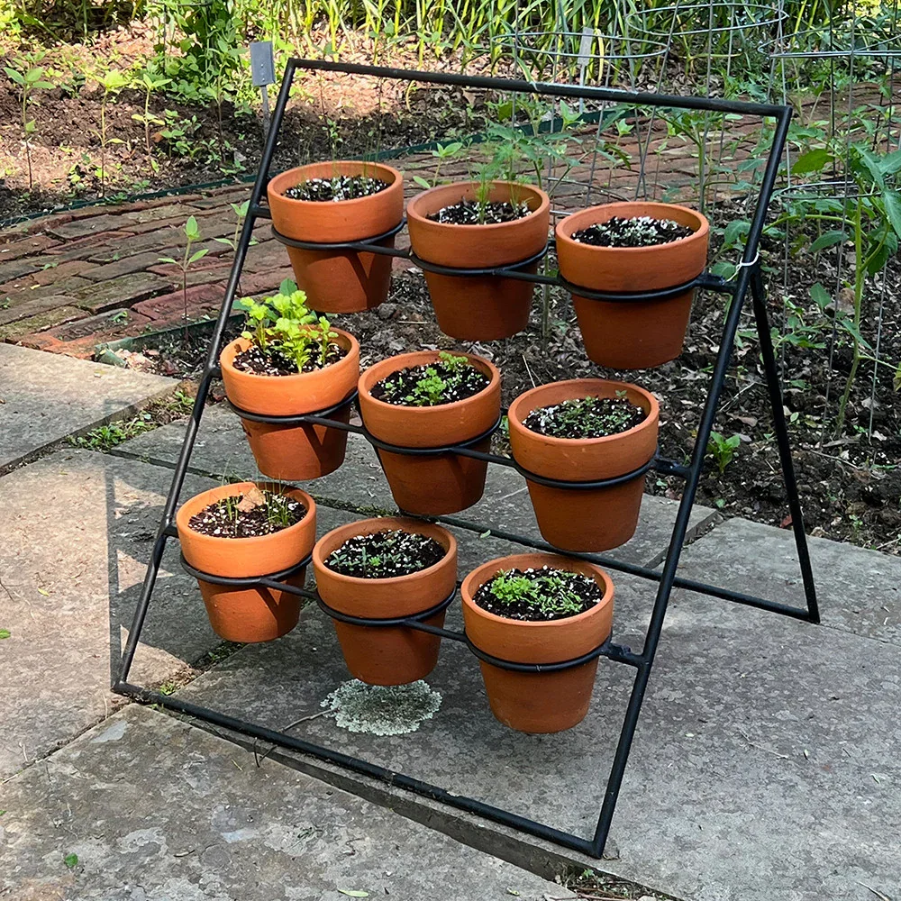 Image of Terracotta Planter Stand Including 9 Pots