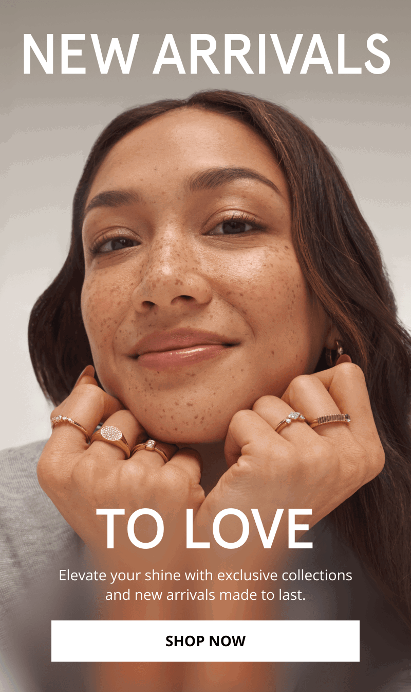 A model wearing an assortment of gold and diamond rings on both hands. To love, new arrivals made to last. Click shop now.