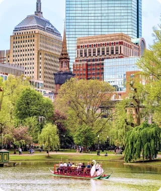 Boston skyline and church steeple from the Public Garden.