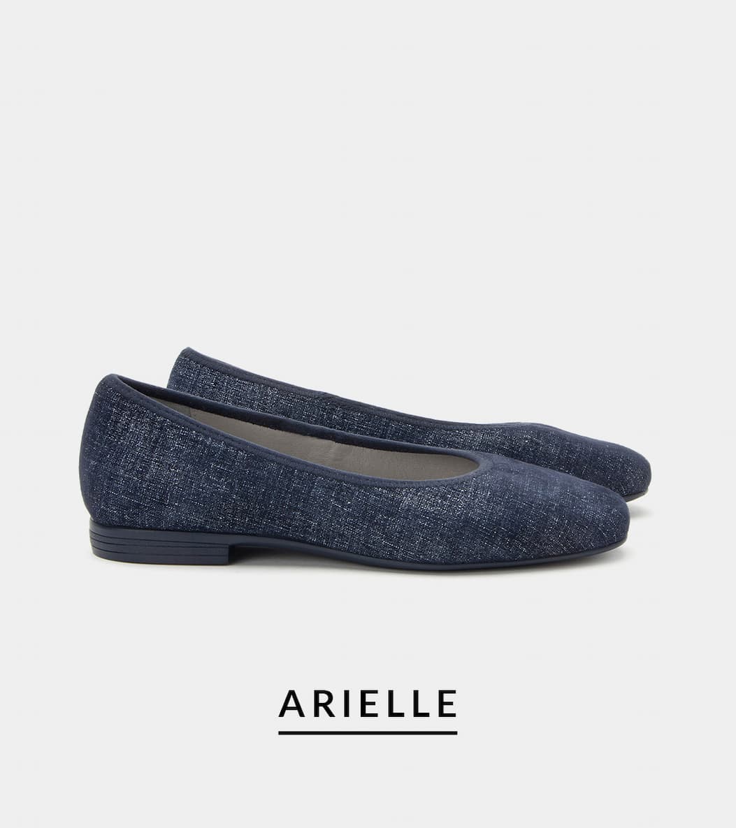 Side view of Alegria Arielle ballet flat on tailored navy suede, with slip resistant outsole and Signature Arch One contoured arch footbed. 