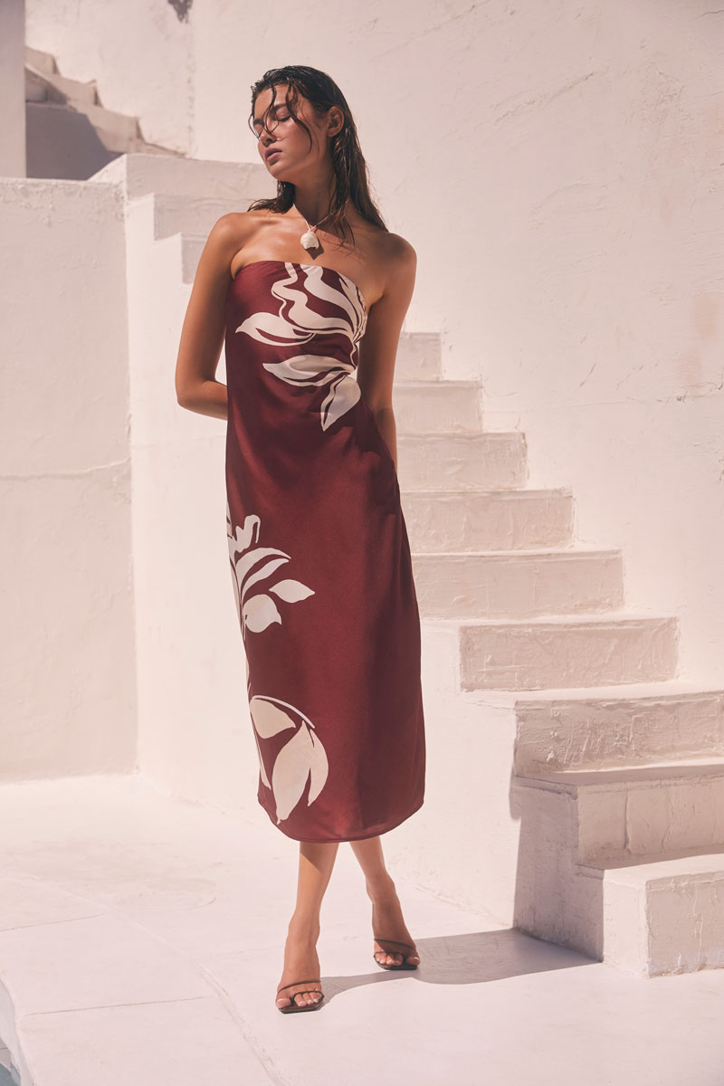 Woman Wearing Floral Satin Strapless Maxi Dress