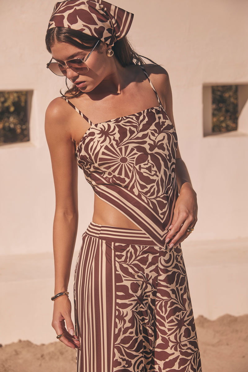 Woman Wearing Pointed Hem Spaghetti Strap Tank Top