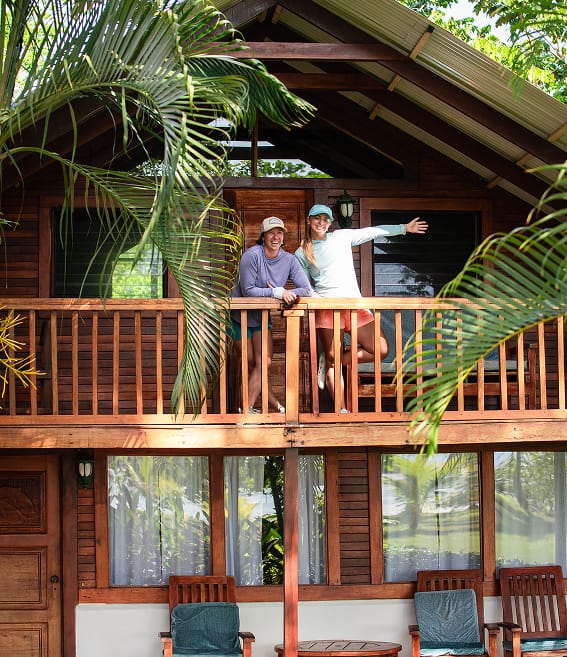 Two PFG ambassadors standing on a deck in Costa Rica.